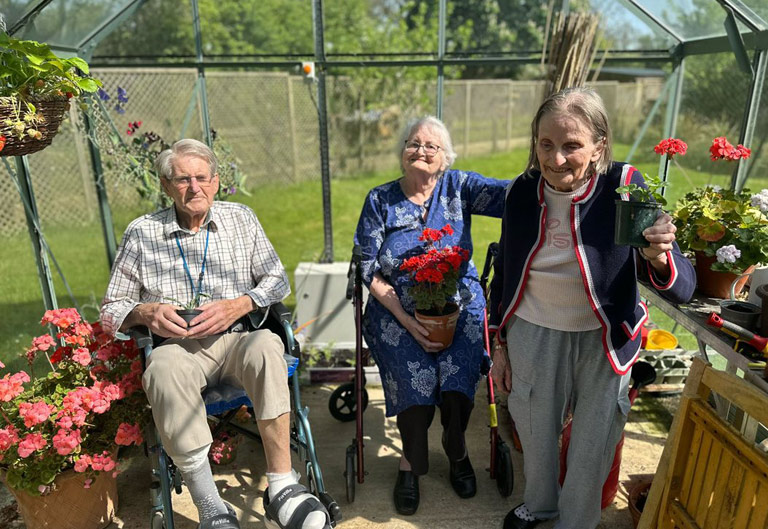 Best Care Home In Buckinghamshire - Gardening In The Greenhouse